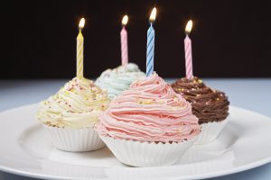 Pastel cupcakes with candles - Happy Birthday ITV Win